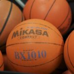 por que a bola de basquete e laranja